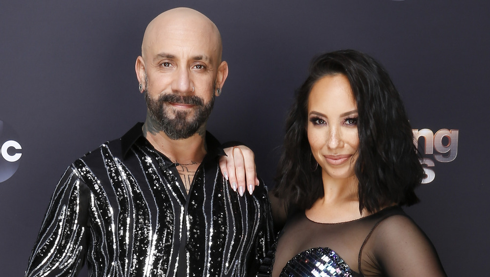 A.J. McLean and Cheryl Burke posing together at DWTS