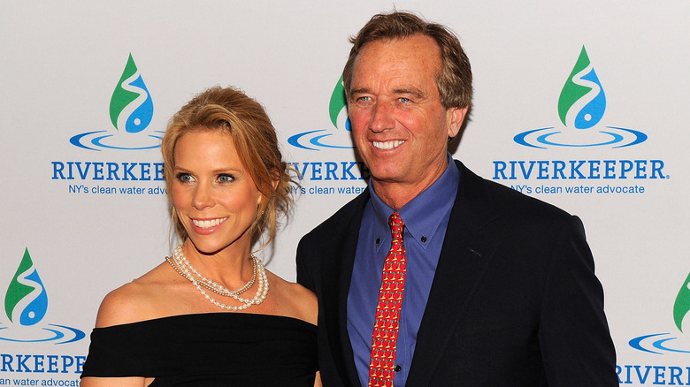 Cheryl Hines and Robert F. Kennedy Jr. posing for photos at the 2012 Riverkeeper's Annual Fishermen's Ball