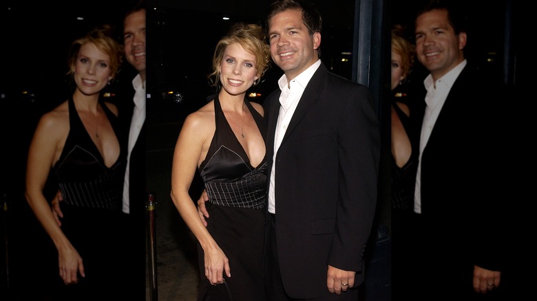 Cheryl Hines and Paul Young posing in black attire