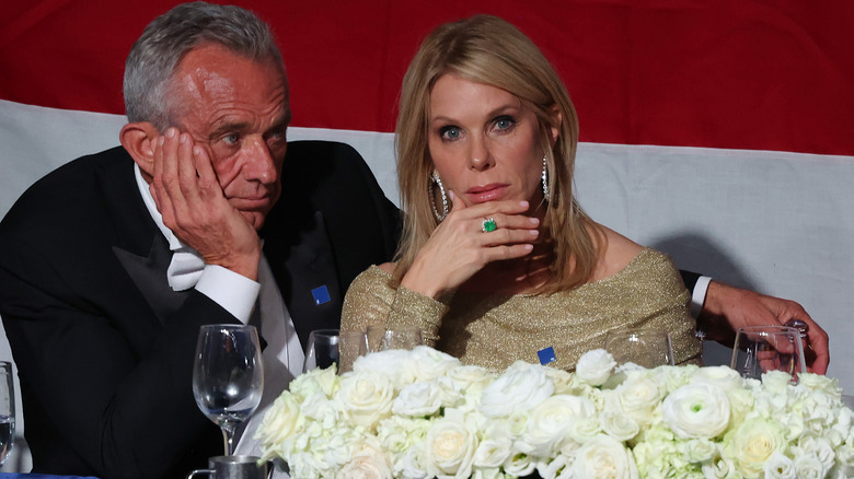 Robert F. Kennedy Jr. and Cheryl Hines listening to Donald J. Trump speak at the nnual Alfred E. Smith Foundation Dinner