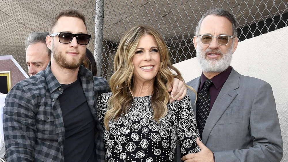 Chet Hanks, Rita Wilson, and Tom Hanks pose