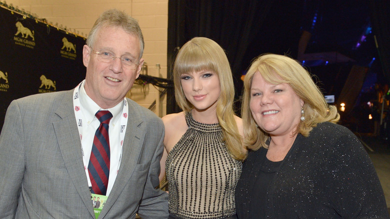 Taylor Swift with her parents, Andrea and Scott Swift