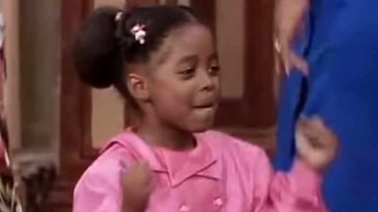 Young Keshia Knight Pulliam with fists up