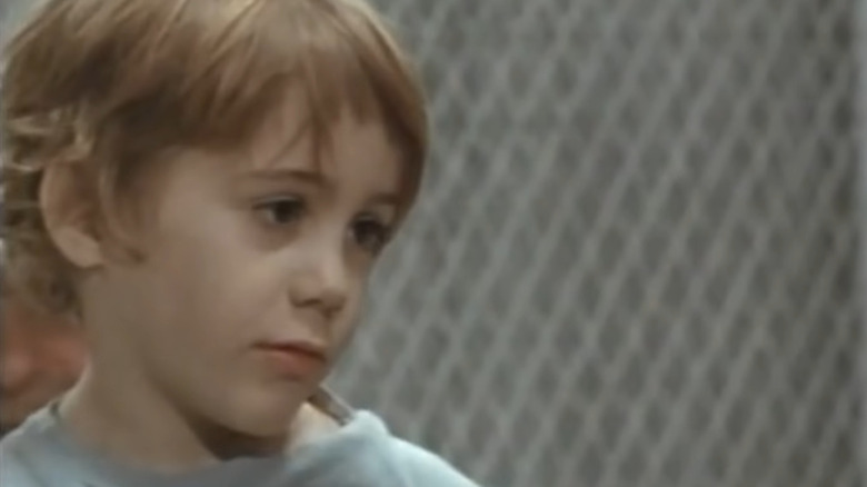 Young Robert Downey Jr. in Pound, looking off