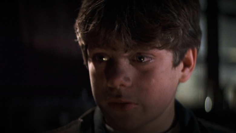 Young Sean Astin looking teary-eyed