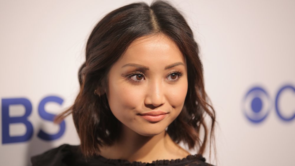 Brenda Song smirking 