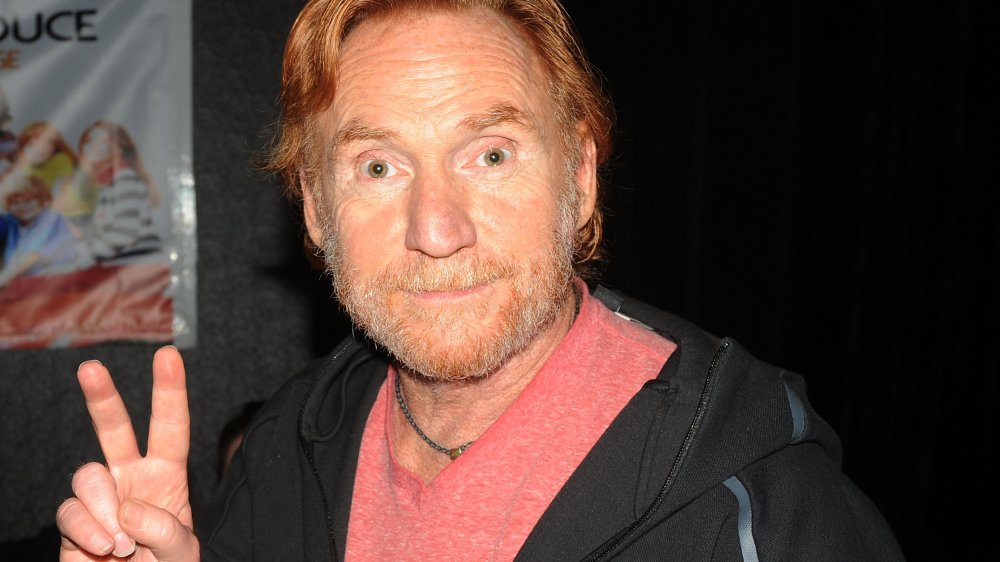 Danny Bonaduce giving a peace sign