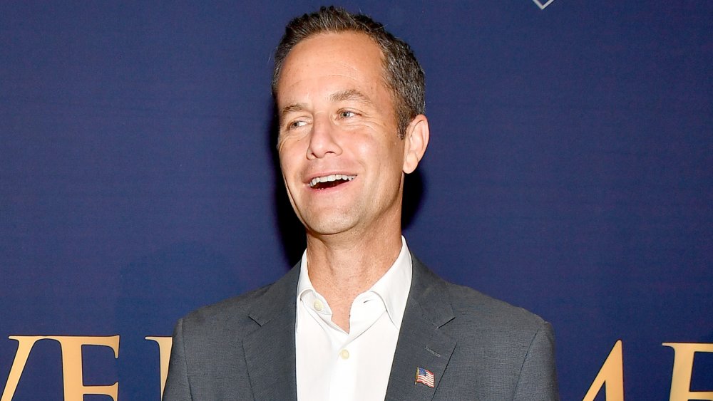 Kirk Cameron smiling at a red carpet event 