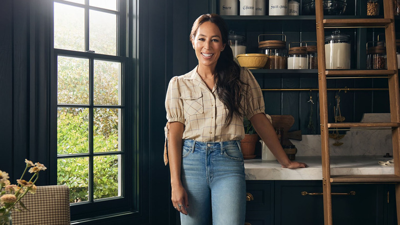 Joanna Gaines standing in her kitchen