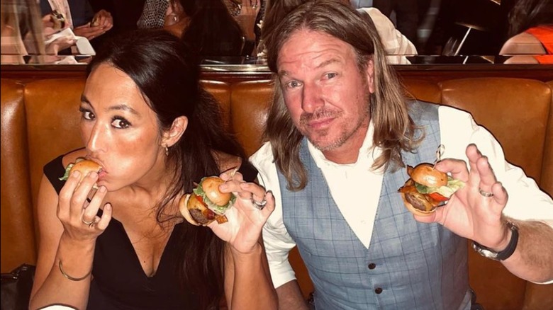 Joanna Chip Gaines eating burgers