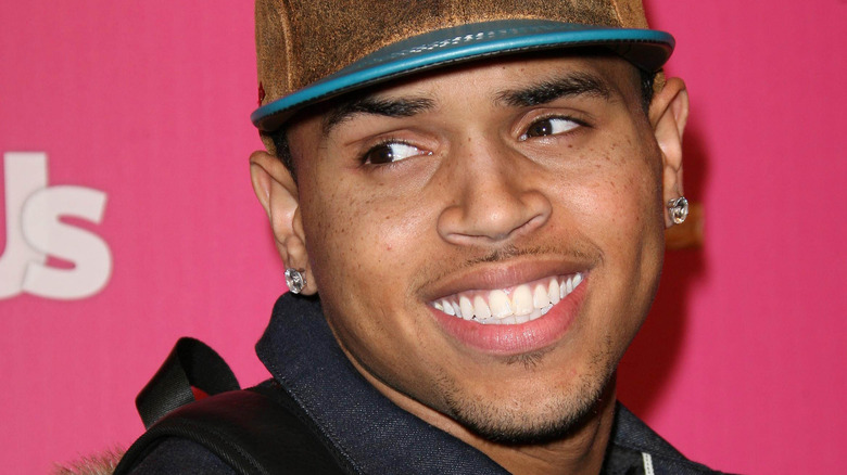 Chris Brown smiling baseball cap