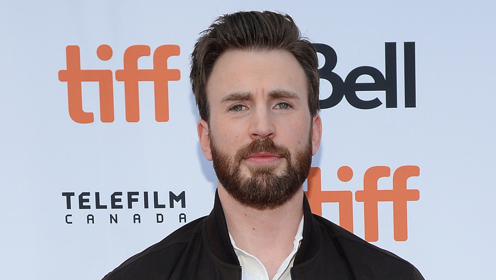 Chris Evans looking serious at a film festival 