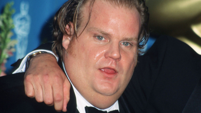 Chris Farley posing, mouth open