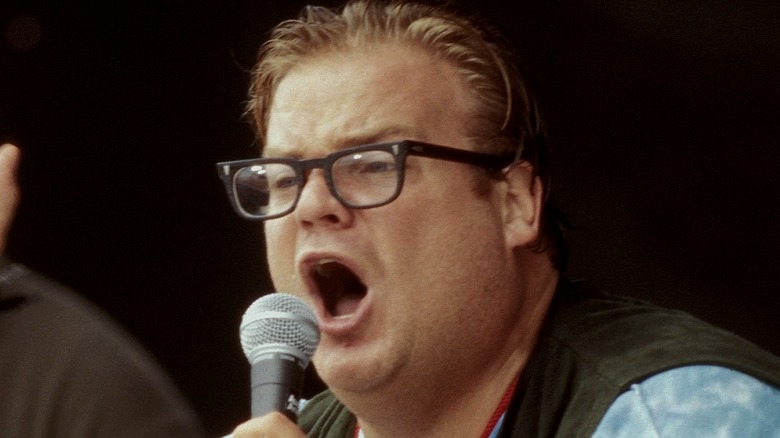 Chris Farley yelling into microphone