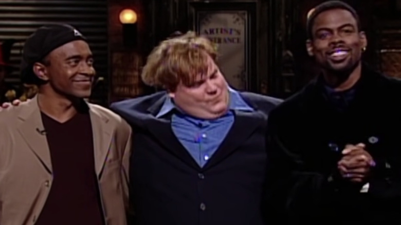 Chris Farley arm in arm with Tim Meadows and Chris Rock