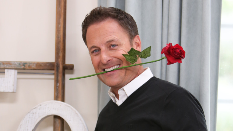 Chris Harrison holding a rose 