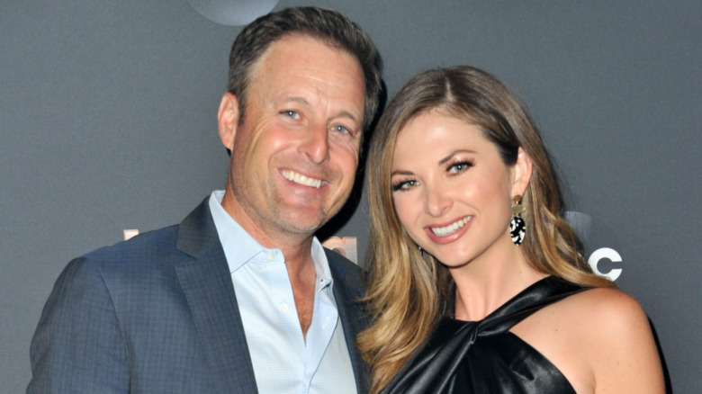  Chris Harrison and Lauren Zima pose together 