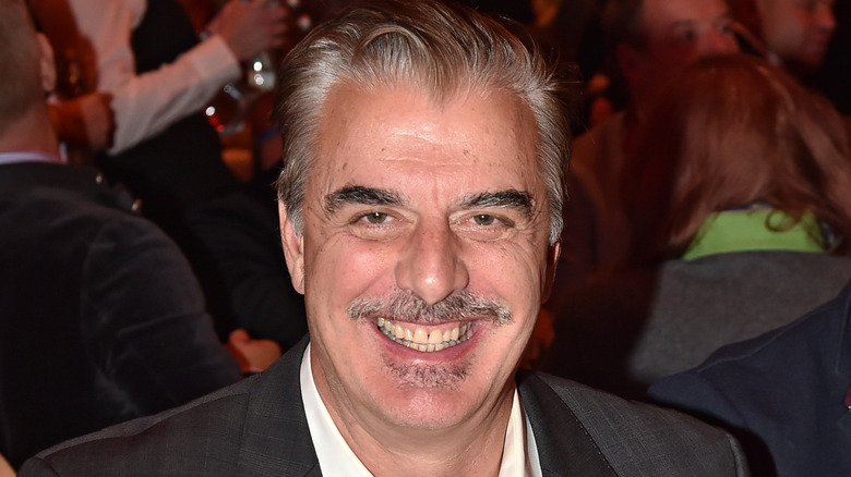 Chris Noth smiling at an event