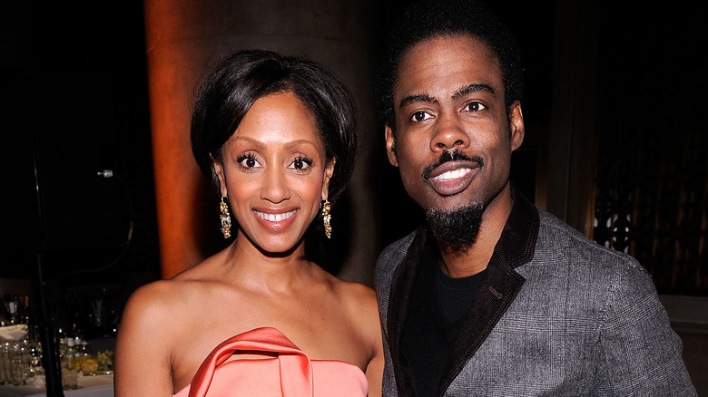 Chris Rock poses with his wife