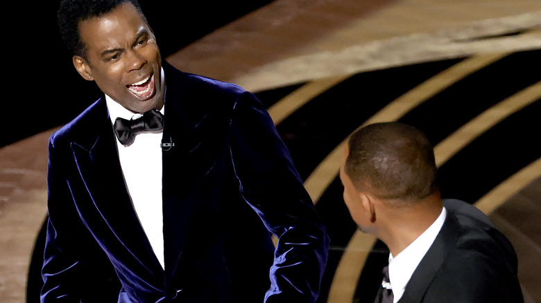 Will Smith appears to slap Chris Rock onstage during the 94th Annual Academy Awards