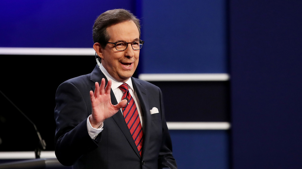 Chris Wallace speaks to the guests and attendees during the third U.S. presidential debate at the Thomas & Mack Center on October 19, 2016