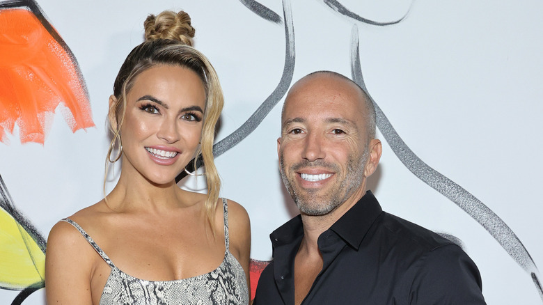 Chrishell Stause and Jason Oppenheim smiling