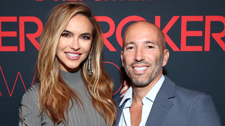 Chrishell Stause and Jason Oppenheim posing together