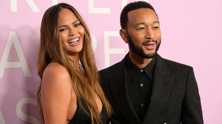 Chrissy Teigen and John Legend at the 2024 Green Carpet Fashion Awards