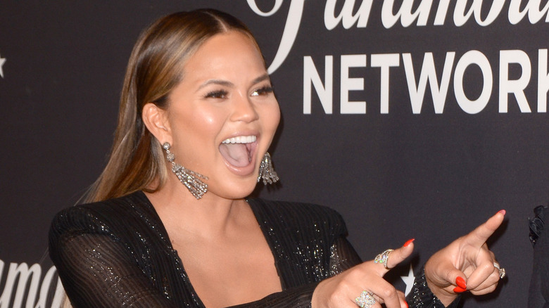 Chrissy Teigen laughing 