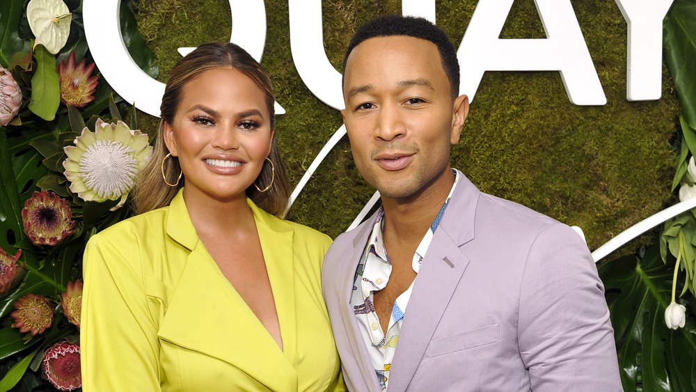 Chrissy Teigen, John Legend, posing