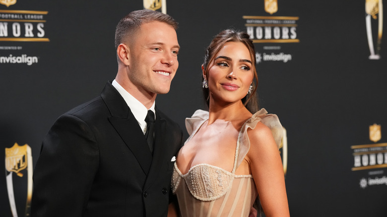 Christian McCaffrey Olivia Culpo posing