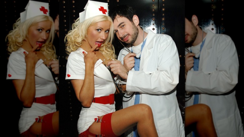 Christina Aguilera wearing a nurse's outfit and Jordan Bratman wearing a doctor's costume