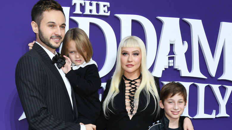 Christina Aguilera posing with her kids