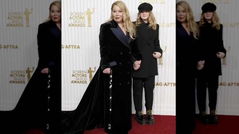 Christina Applegate holding hands with daughter