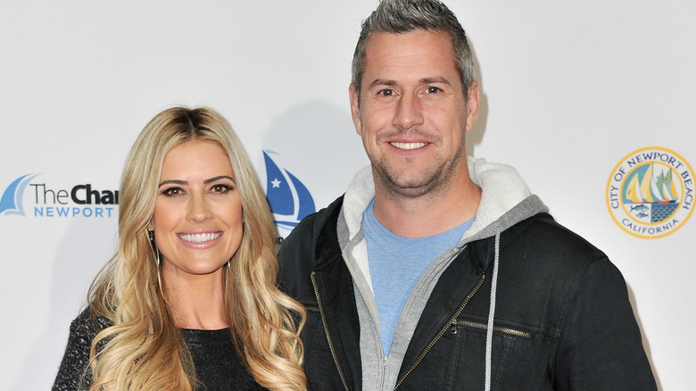 Christina Haack, smiling, blond hair down, wearing hoops; Ant Anstead, smiling, wearing jacket, 2019 red carpet