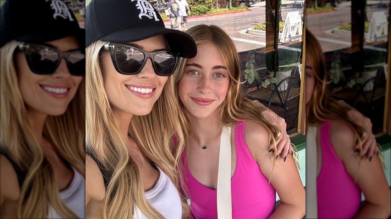 Christina Hall stands with arm around daughter Taylor