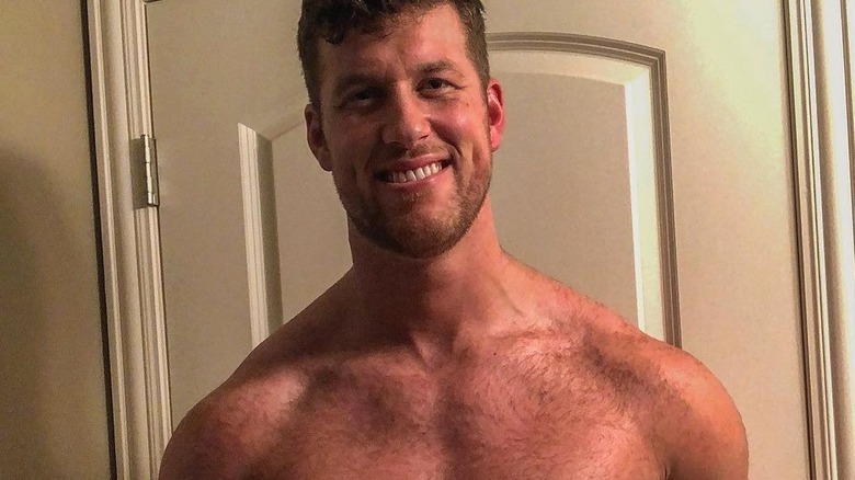 Clayton Echard posing shirtless