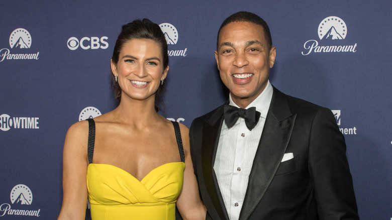 Kaitlan Collins and Don Lemon posing together