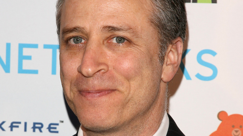 Jon Stewart smirking