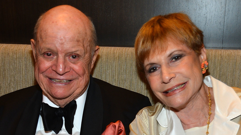 Don Rickles and wife Barbara Rickles smiling for the camera