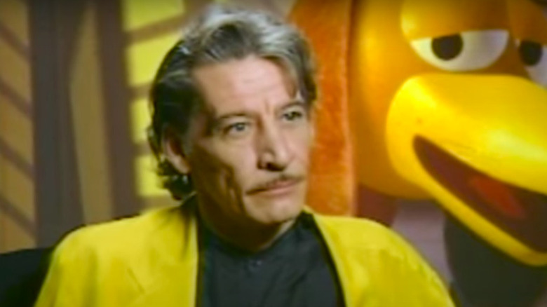 Jim Varney seated