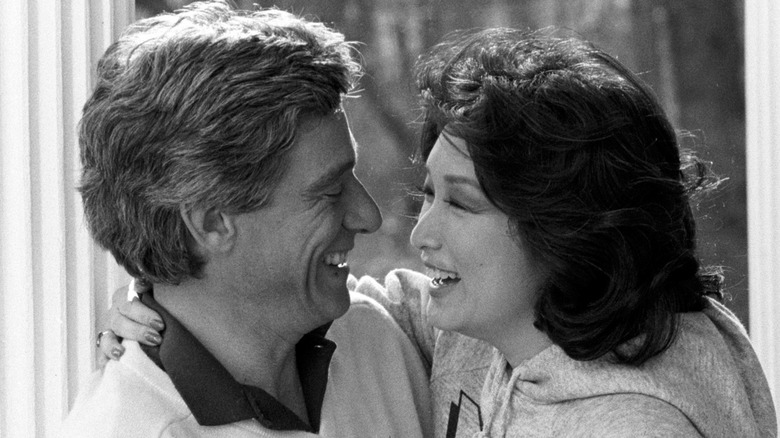 Connie Chung and Maury Povich smiling and looking at each other