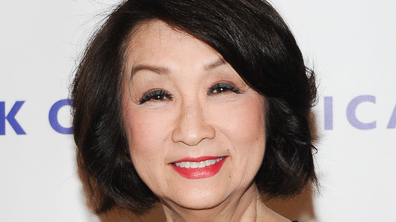 Connie Chung smiling into the camera at event