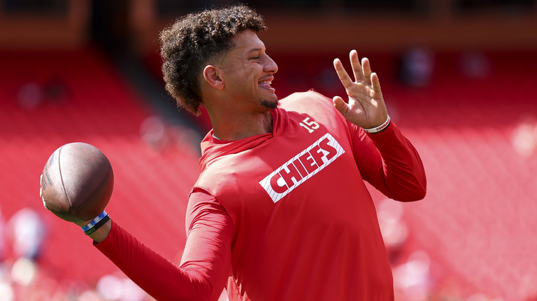 Patrick Mahomes holding a football