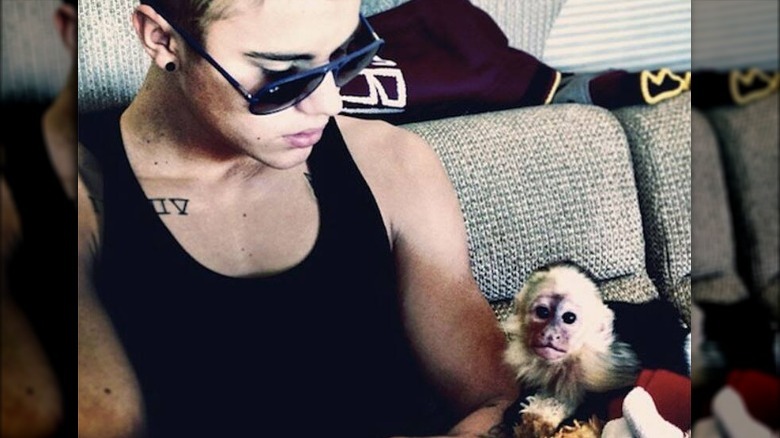 Justin Bieber with monkey