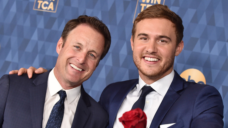 Chris Harrison and Peter Weber smiling