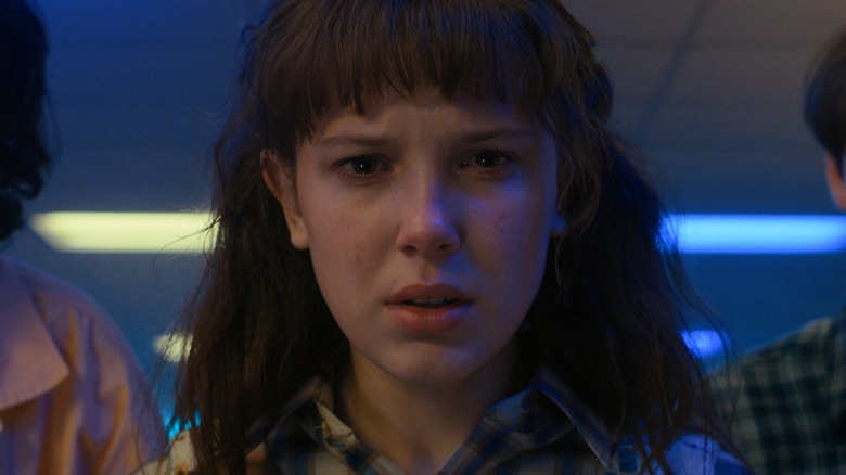 Eleven looking upset Stranger Things