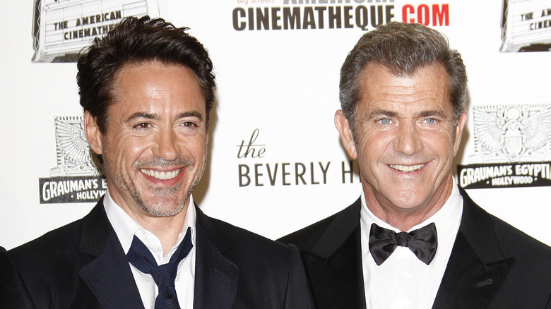 Robert Downey Jr. and Mel Gibson smiling