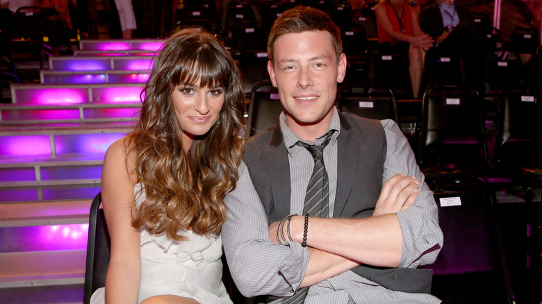 Lea Michele seated beside Cory Monteith 