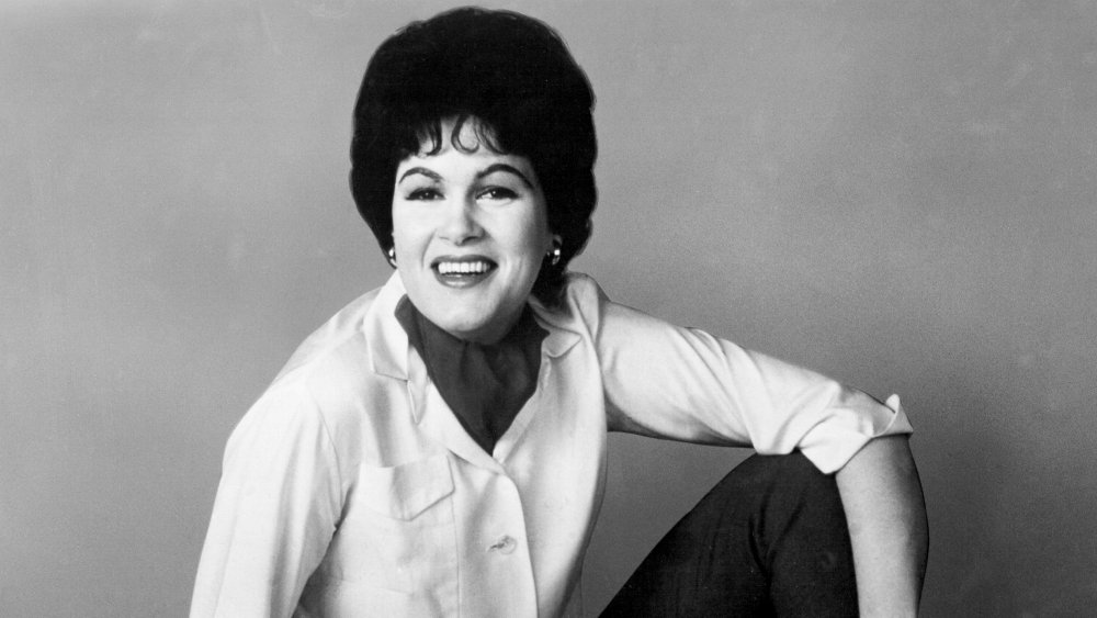 Patsy Cline sitting and smiling